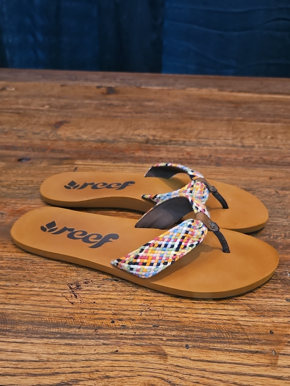 Reef Women’s Tan Footbed Flip Flops with Multicolor Braided Straps
